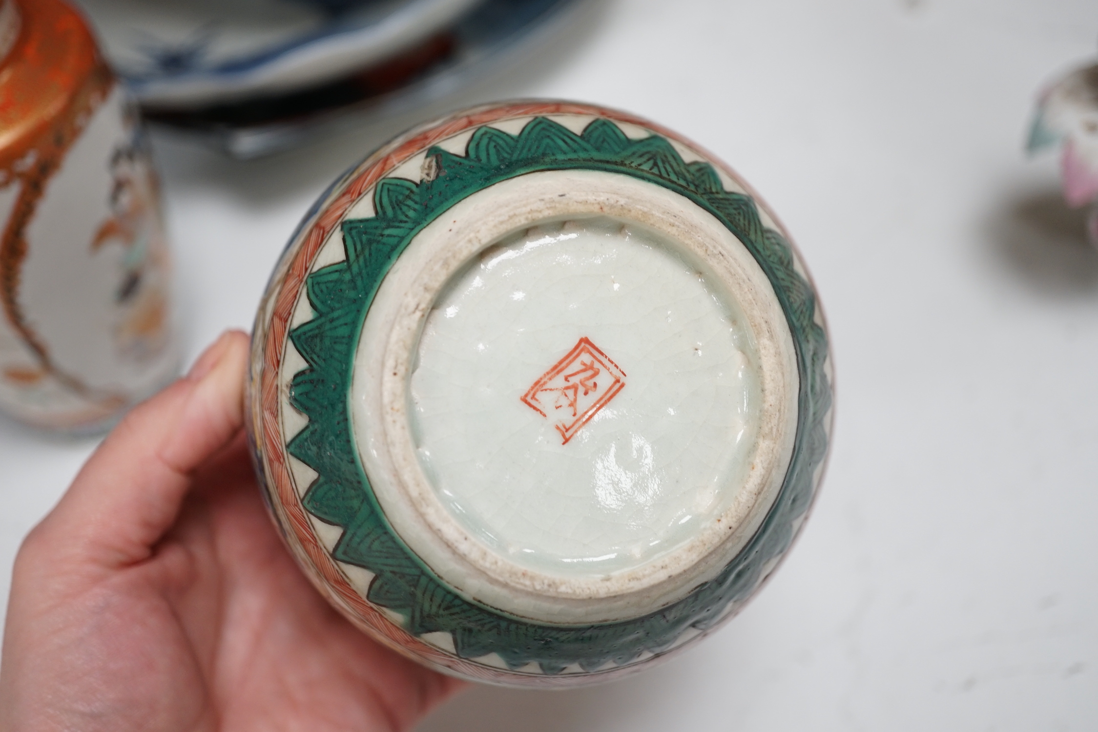 A group of Japanese and Korean ceramics, 18th century and later, to include an Arita blue and white scalloped dish, and Imari fish dish etc.